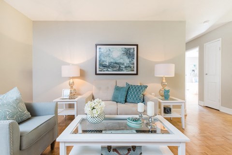 a living room with a couch and a coffee table